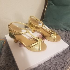Gold dancing shoes with suede bottoms